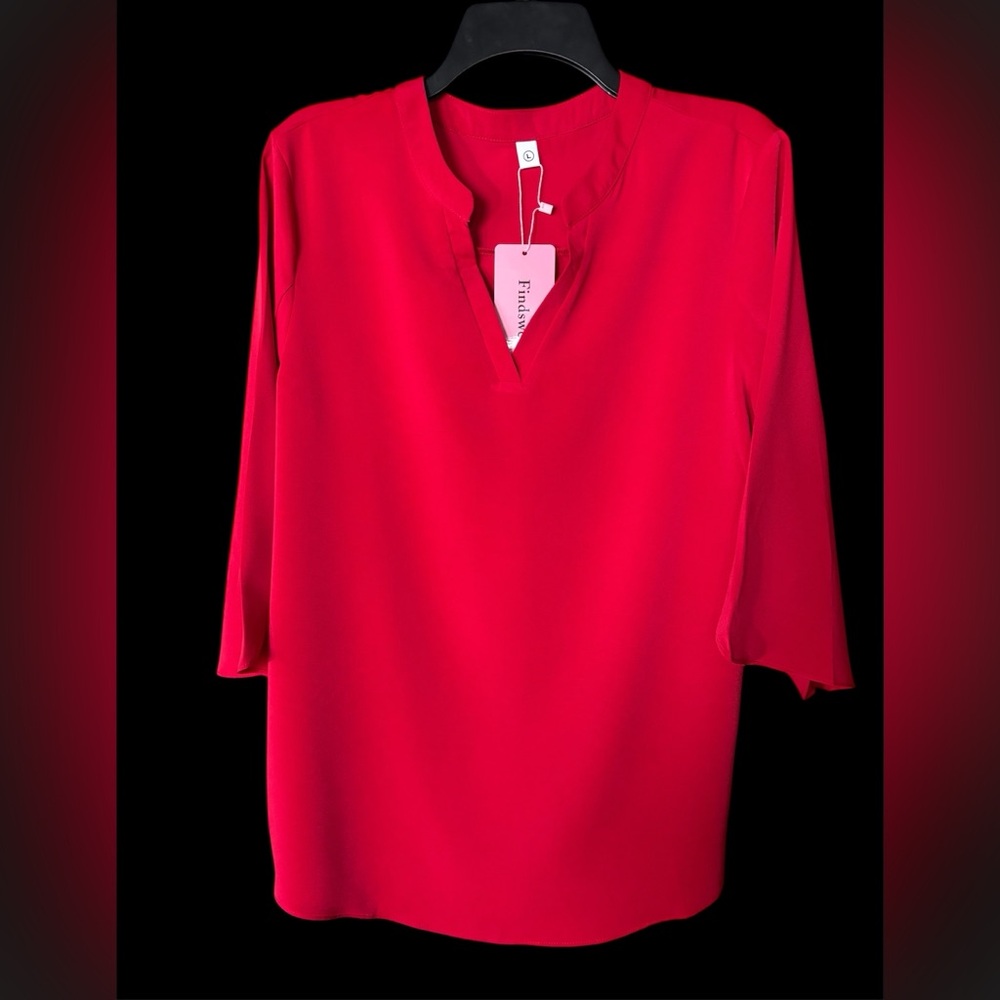 Women's red blouse with wide, flowing sleeve ending in a structured hem NWT